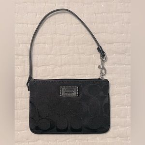 EUC Coach wristlet in signature fabric